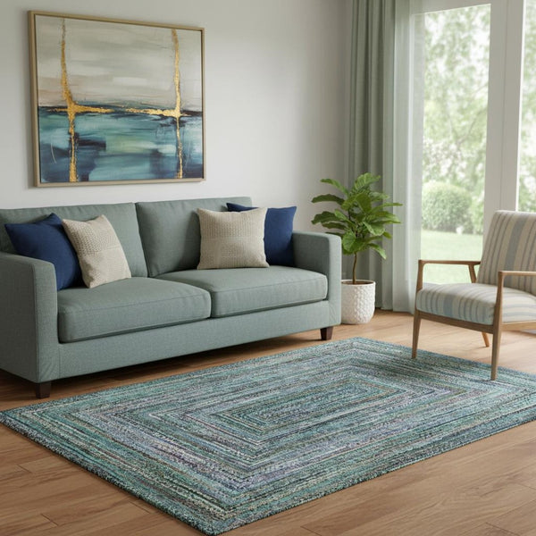 HomeRoots 5' X 8' Teal and Brown Geometric Area Rug - Durable, Washable, UV-Protected for Family Spaces 699264