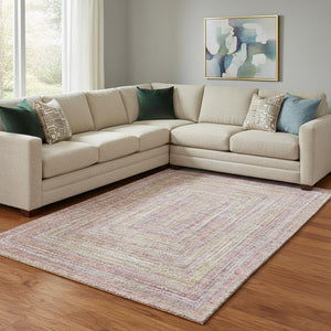 HomeRoots 8' X 10' Geometric Washable Area Rug in Rust and Mauve - UV Protected, Stain Resistant, Durable Design 699284