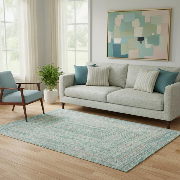 HomeRoots 5' X 8' Teal and Ivory Geometric Washable Area Rug - Stain Resistant, UV Protected, Modern Design 699294