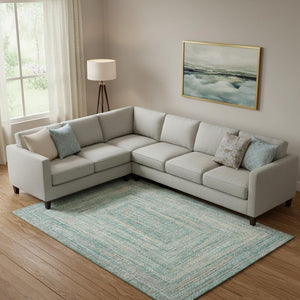 HomeRoots 9' X 12' Teal and Ivory Geometric Area Rug - Durable, Stain-Resistant, UV-Protected for High-Traffic Spaces 699297