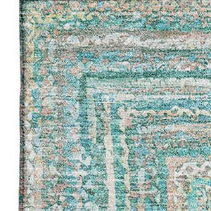 HomeRoots 9' X 12' Teal and Ivory Geometric Area Rug - Durable, Stain-Resistant, UV-Protected for High-Traffic Spaces 699297