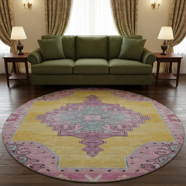 HomeRoots 8' Elegant Gold, Pink & Teal Oriental Washable Round Rug with UV Protection for High Traffic Areas 699457