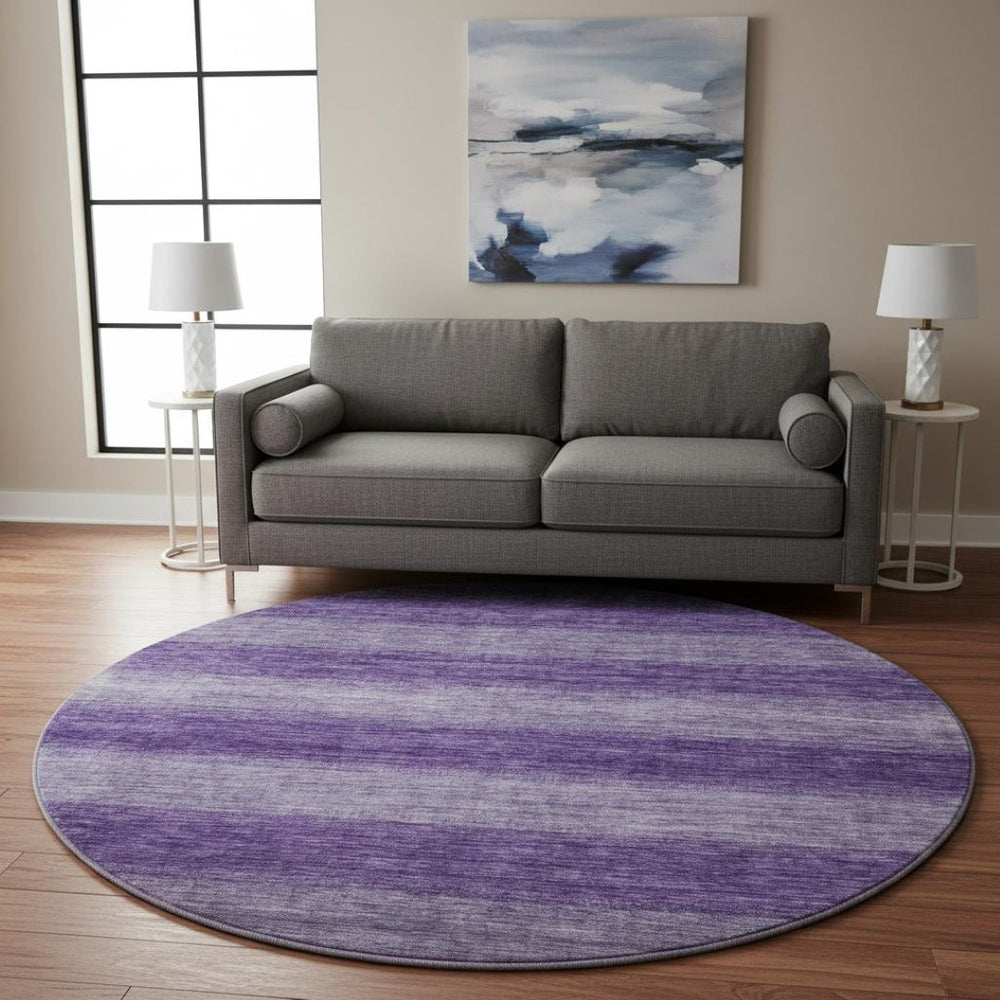 HomeRoots 8' Vibrant Purple and Lavender Striped Washable Round Rug with UV Protection for Indoor/Outdoor Use 699559