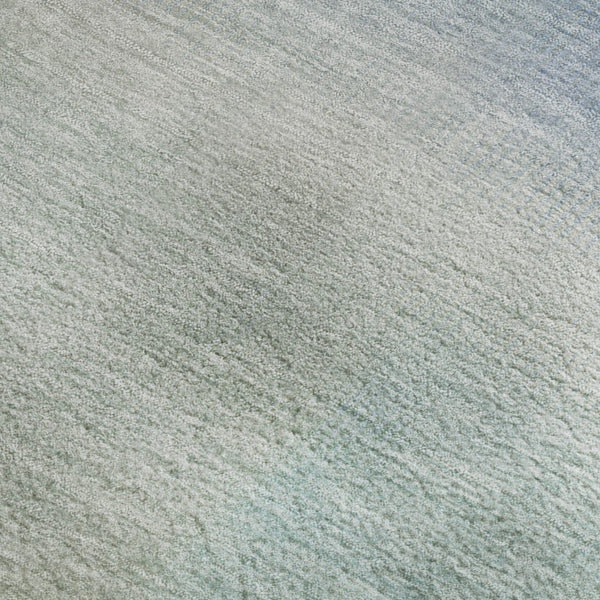 HomeRoots 5' X 8' Sky Blue Peach & Lilac Striped Washable Area Rug with UV Protection for Stylish Durability 699618