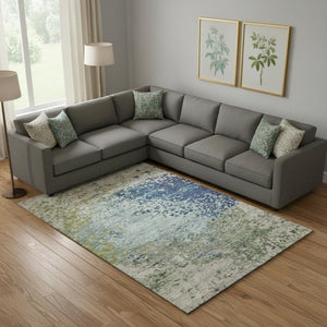 HomeRoots 9' X 12' Abstract Area Rug in Blue, Green & Beige - Washable, UV Protection, Pet-Friendly Design 699645