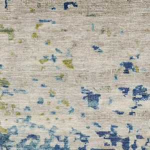 HomeRoots 9' X 12' Abstract Area Rug in Blue, Green & Beige - Washable, UV Protection, Pet-Friendly Design 699645