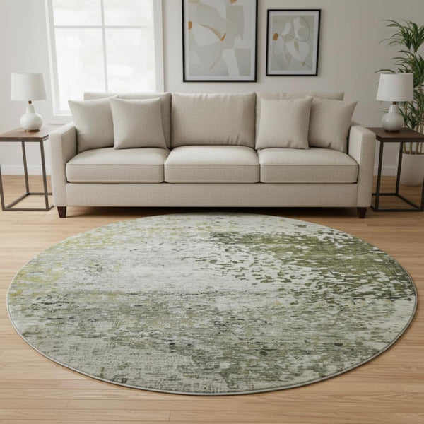 HomeRoots 8' Abstract Graphite Green and Ivory Round Rug - Washable, UV Protected, Modern Design for Any Space 699655