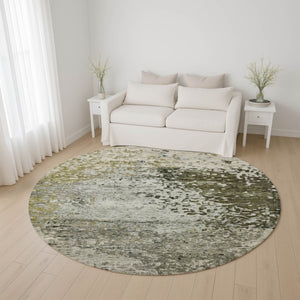 HomeRoots 8' Abstract Graphite Green and Ivory Round Rug - Washable, UV Protected, Modern Design for Any Space 699655