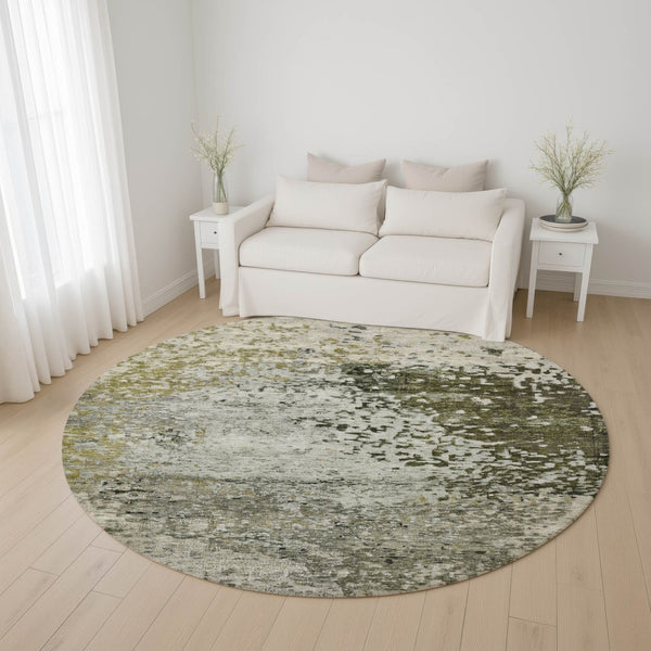 HomeRoots 8' Abstract Graphite Green and Ivory Round Rug - Washable, UV Protected, Modern Design for Any Space 699655