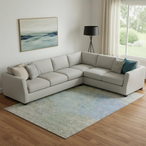 HomeRoots 10' X 14' Modern Abstract Washable Area Rug in Sky Blue & Green with UV Protection for Busy Homes 699664