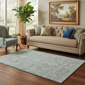 HomeRoots 5' X 8' Teal and Beige Oriental Area Rug - Washable, UV Protected, Stain Resistant for Any Space 699923