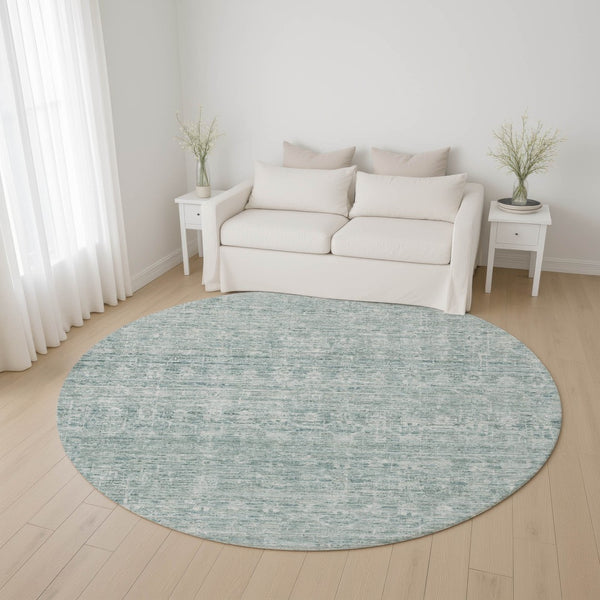 HomeRoots 8' Turquoise and Ivory Striped Round Rug - Durable, Washable, UV-Protected for Indoor & Outdoor Use 699984