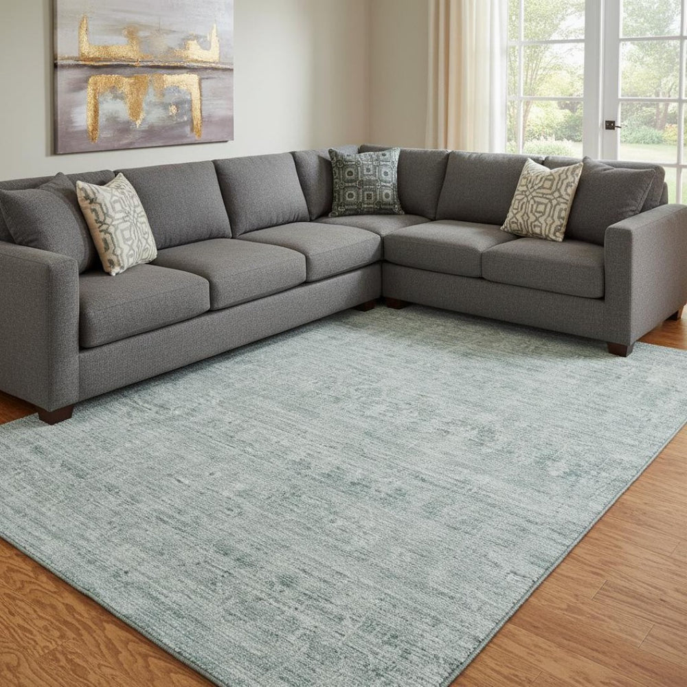 HomeRoots 8' X 10' Washable Turquoise and Ivory Striped Area Rug with UV Protection for Homes and Patios 699985