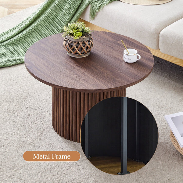 English Elm A modern circular coffee table Walnut MDF with hidden storage, cylindrical textured legs, polished edge detail, 27.5" diameter W1512P410543