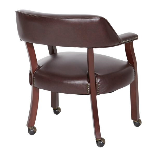 OSP Home Furnishings Traditional Guest Chair with Brass Nailhead Trim Vinyl Upholstery and Rolling Casters TV231-JT4
