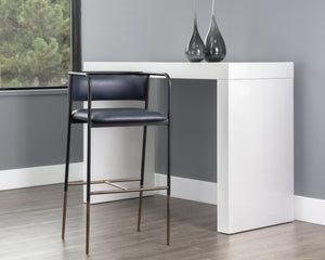 Sunpan Brenan Counter Stool - Elegant Curved Backrest, Unique Faux Leather, Black Metal Frame & Brass Caps Bravo Admiral