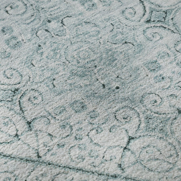HomeRoots 8' Aqua and Ivory Geometric Round Rug - Washable, UV Protected, Stylish & Durable for Any Space! 700020