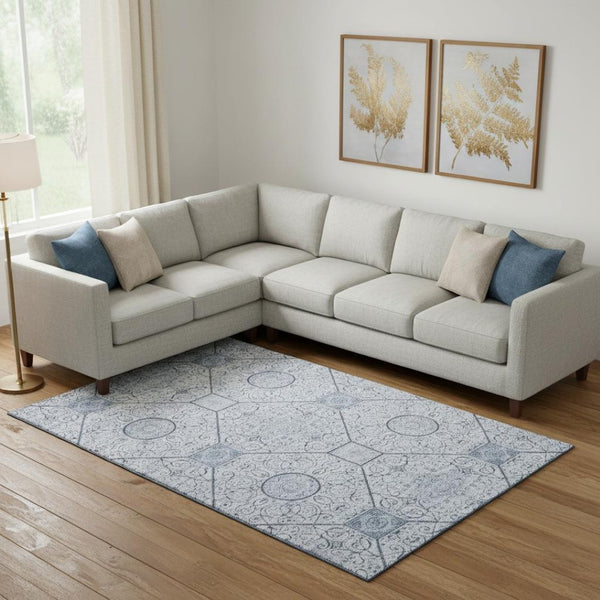 HomeRoots 10' X 14' Blue and Ivory Geometric Washable Area Rug - UV Protection & Easy Care for Modern Spaces 700035