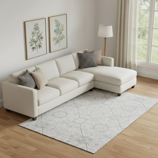 HomeRoots 9' X 12' Stylish Silver & Gray Geometric Washable Area Rug with Non-Slip Backing & UV Protection 700040