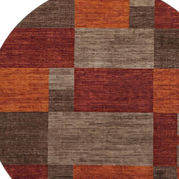 HomeRoots 8' Chocolate Orange and Rust Geometric Round Rug - Washable, UV Protected, Non-Slip Design for Home! 700050