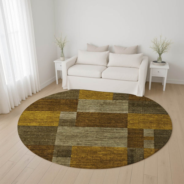 HomeRoots 8' Stylish Pewter Gold & Brown Geometric Round Rug - Washable, UV-Protected, Stain-Resistant Design 700056
