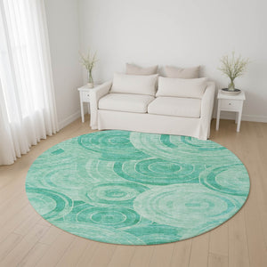 HomeRoots 8' Teal and Ivory Geometric Round Rug - Washable, UV-Protected, Stain-Resistant, Non-Slip Backing! 700092
