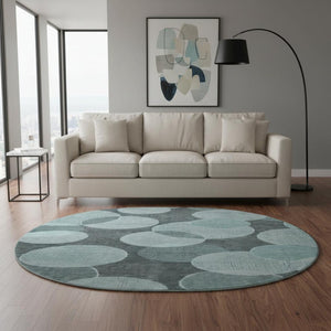 HomeRoots 8' Teal and Sky Blue Geometric Round Rug - Durable, Washable, UV-Protected for Modern Spaces 700178