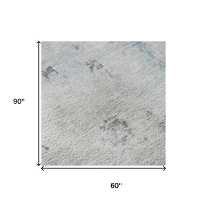 HomeRoots 5' X 8' Sky Blue Ivory Gray Abstract Area Rug - Washable, UV-Protected, Kid & Pet Friendly Design 700231