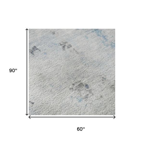 HomeRoots 5' X 8' Sky Blue Ivory Gray Abstract Area Rug - Washable, UV-Protected, Kid & Pet Friendly Design 700231