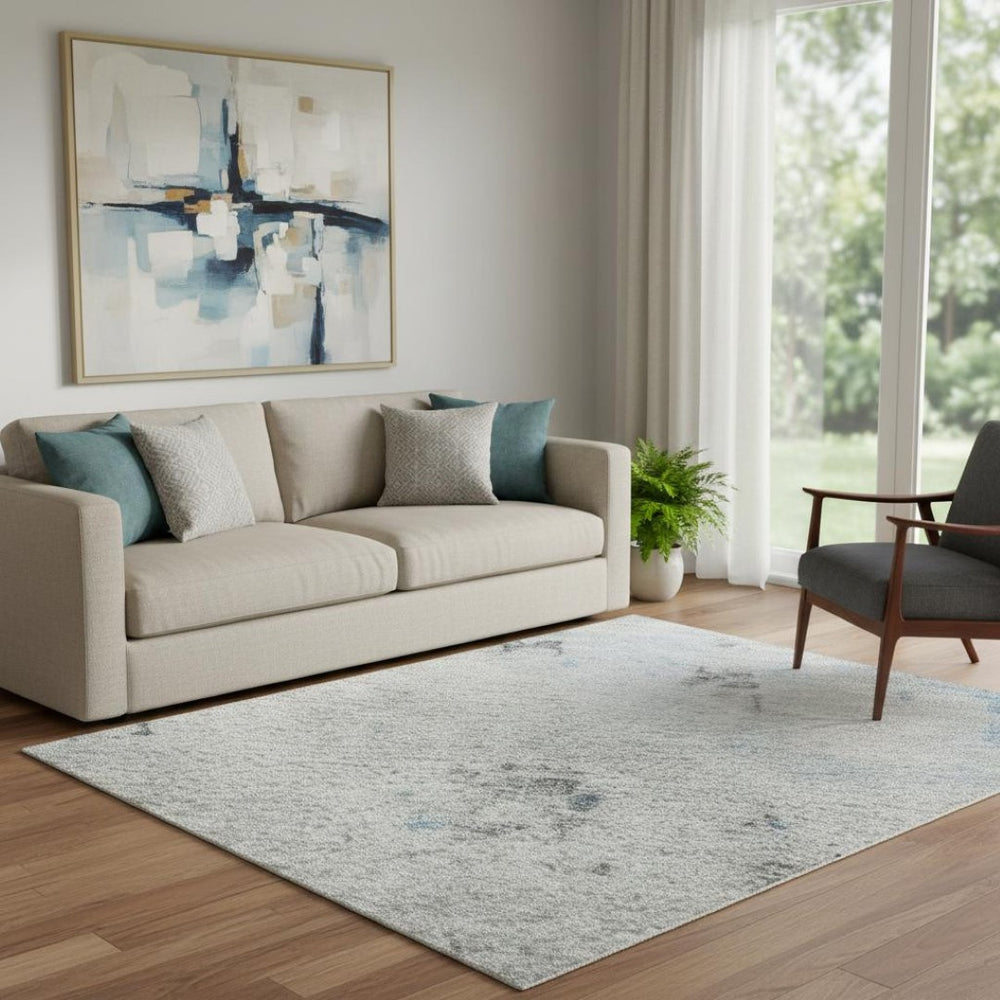 HomeRoots 5' X 8' Sky Blue Ivory Gray Abstract Area Rug - Washable, UV-Protected, Kid & Pet Friendly Design 700231