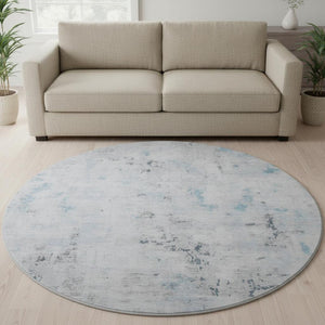 HomeRoots 8' Sky Blue Ivory and Gray Abstract Washable Round Rug - Durable, Stain Resistant, UV Protected Elegance 700232