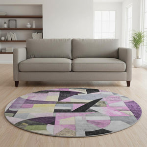 HomeRoots 8' Bold Purple, Black & Yellow Abstract Washable Round Rug with UV Protection for Modern Spaces 700370