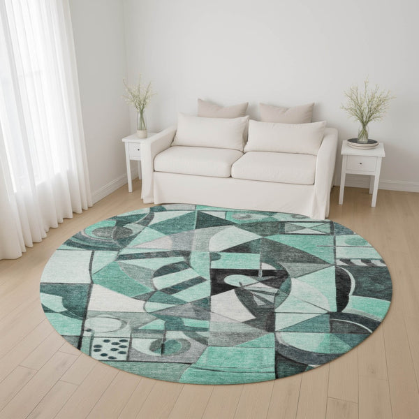 HomeRoots 8' Modern Teal, Black & Ivory Abstract Washable Round Rug with UV Protection for High-Traffic Areas 700424