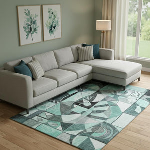 HomeRoots 9' X 12' Teal, Black & Ivory Abstract Washable Area Rug – Stylish, Durable & UV-Protected Design 700426