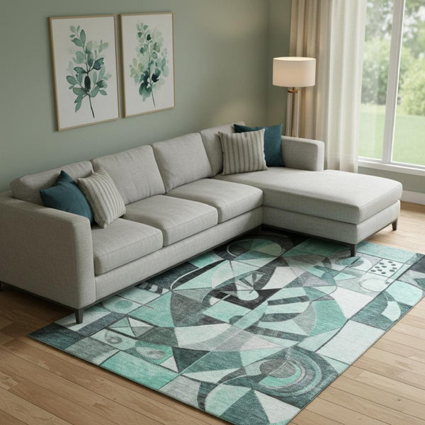 HomeRoots 9' X 12' Teal, Black & Ivory Abstract Washable Area Rug – Stylish, Durable & UV-Protected Design 700426