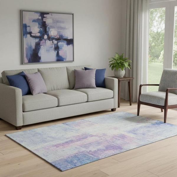 HomeRoots 5' X 8' Sky Blue & Ivory Abstract Area Rug - Durable, Washable, Stain-Resistant with UV Protection 700447