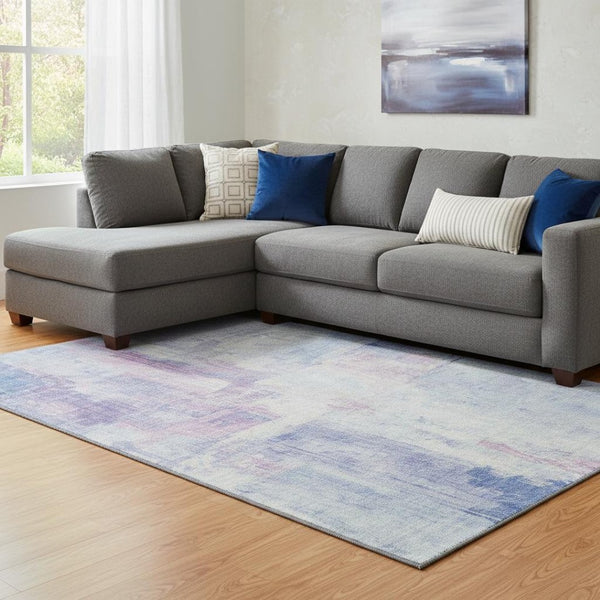 HomeRoots 8' X 10' Sky Blue & Ivory Abstract Area Rug – Washable, UV-Protected, Soft for Stylish Living Spaces 700449