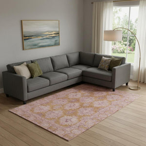 HomeRoots 10' Blush and Orange Oriental Washable Area Rug with UV Protection for Stylish Family Spaces 700481