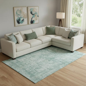HomeRoots 10' Teal and Ivory Oriental Area Rug - Stylish, Washable, UV-Protected for High-Traffic Spaces 700667