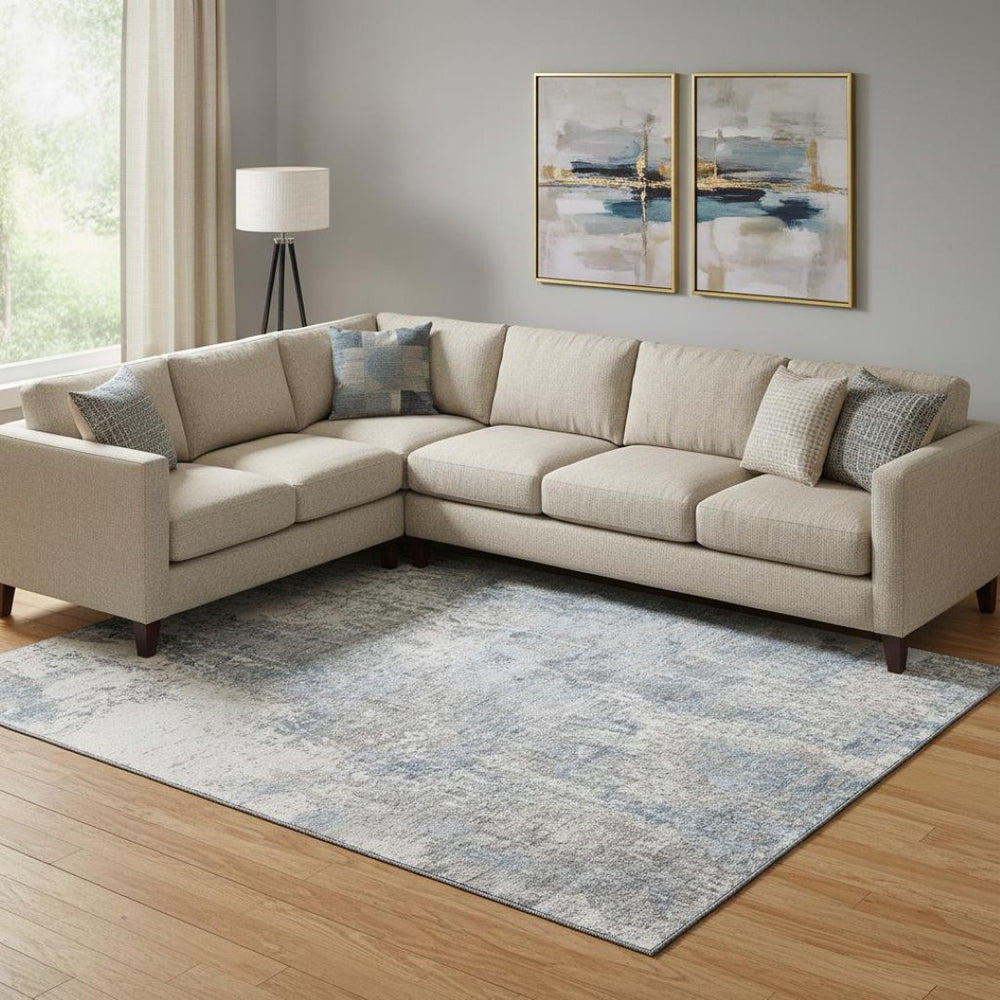 HomeRoots 9' X 12' Blue And Ivory Abstract Area Rug - Durable, Washable Design with UV Protection for Easy Care 700684