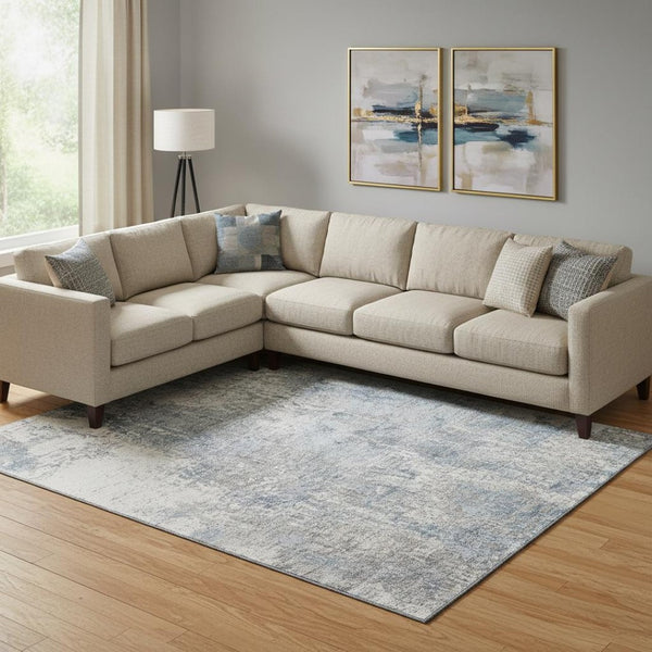 HomeRoots 9' X 12' Blue And Ivory Abstract Area Rug - Durable, Washable Design with UV Protection for Easy Care 700684