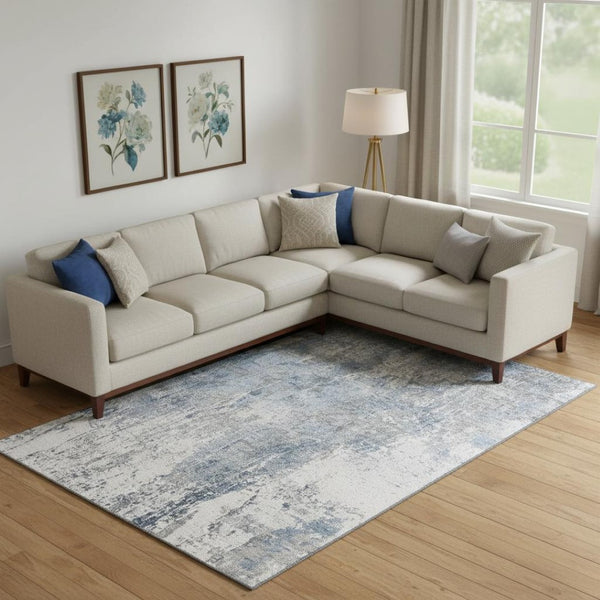 HomeRoots 10' X 14' Blue And Ivory Abstract Area Rug – Washable, UV-Protected, Durable for High-Traffic Spaces 700685