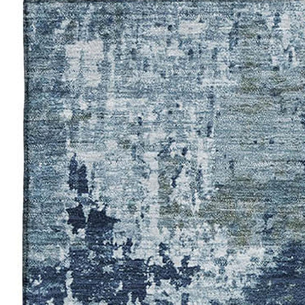 HomeRoots 5' X 8' Blue And Ivory Abstract Washable Area Rug - Durable, UV-Protected, Non-Slip for High Traffic Spaces 700705