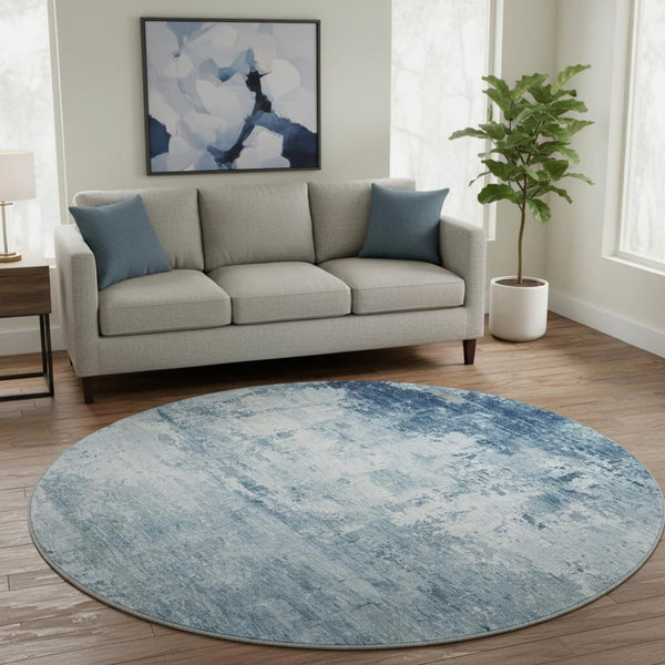 HomeRoots 8' Blue And Ivory Abstract Washable Round Rug - Durable, UV Protected, Perfect for High-Traffic Spaces 700706