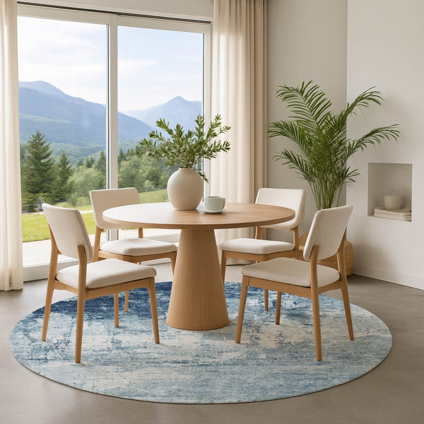 HomeRoots 8' Blue And Ivory Abstract Washable Round Rug - Durable, UV Protected, Perfect for High-Traffic Spaces 700706