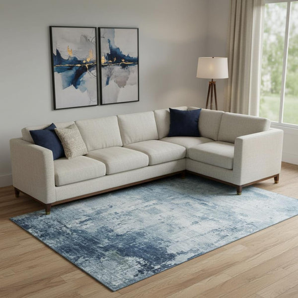 HomeRoots 9' X 12' Blue and Ivory Abstract Area Rug - Durable, Washable, UV-Protected for High-Traffic Spaces 700708
