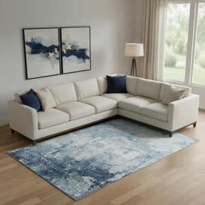 HomeRoots 10' X 14' Blue and Ivory Abstract Area Rug – Durable, Washable, UV-Protected for Modern Living Spaces 700709