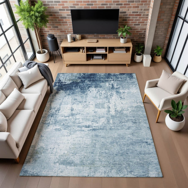 HomeRoots 10' X 14' Blue and Ivory Abstract Area Rug – Durable, Washable, UV-Protected for Modern Living Spaces 700709