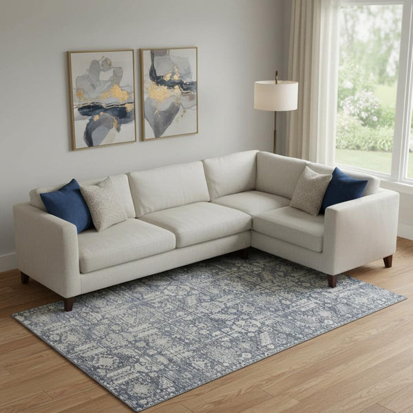 HomeRoots 10' X 14' Blue And Ivory Oriental Washable Area Rug - Stylish, Durable, UV-Protected for Modern Homes 700847