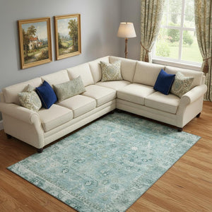 HomeRoots 9' X 12' Elegant Blue and Ivory Oriental Washable Area Rug with UV Protection for Everyday Living 700894
